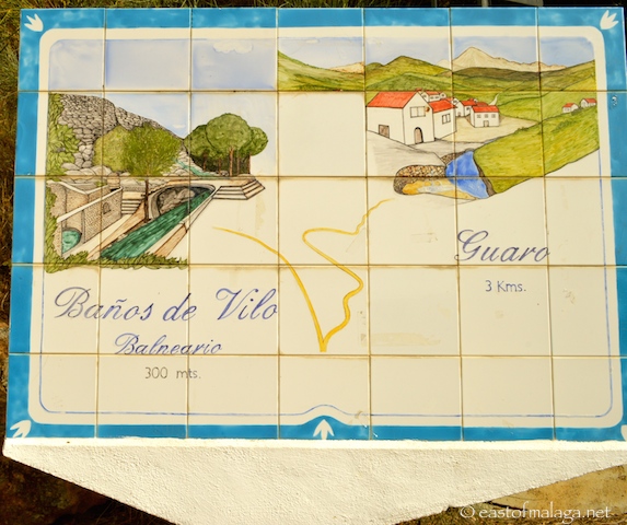 Tiled sign showing the way to the Baños de Vilo, Periana