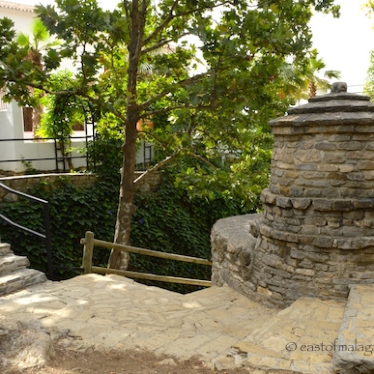 Stone bridge and tower at Baños de Vilo