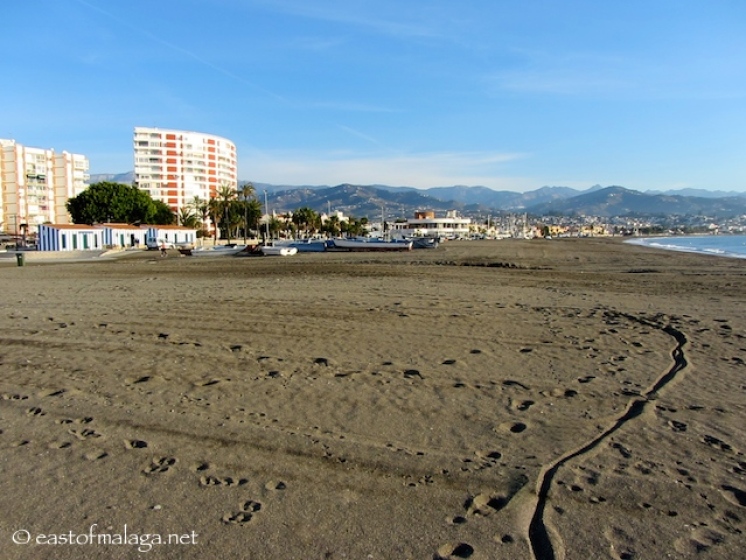 Looking east towards the Sailing club in Torre del Mar from the concrete beach path